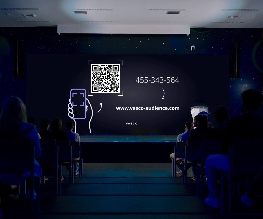 Eine große Leinwand zeigt den Vasco Audience Anmeldebildschirm